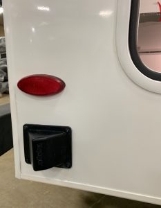 A sensor attaches to the back of the RV.