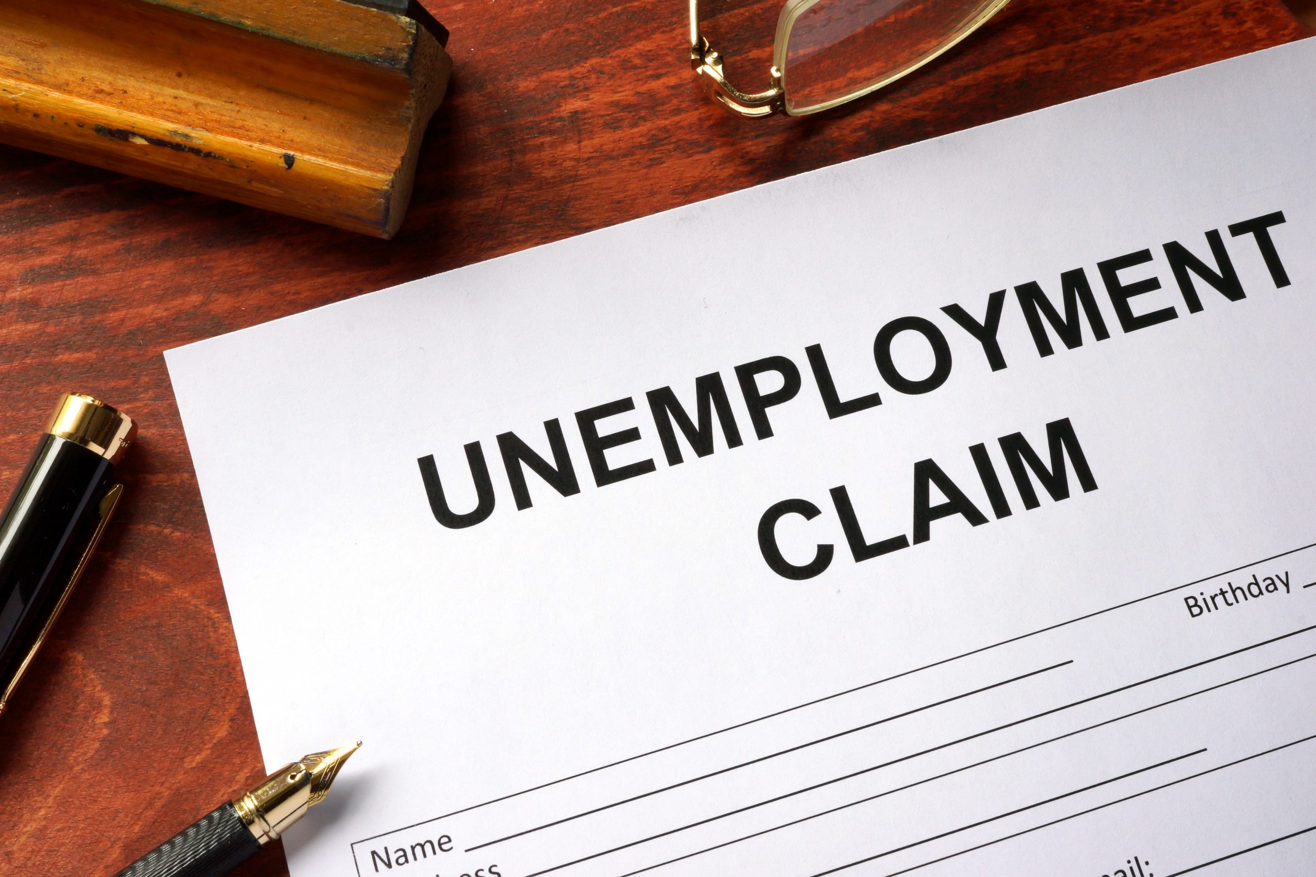 Unemployment claim form on an office table