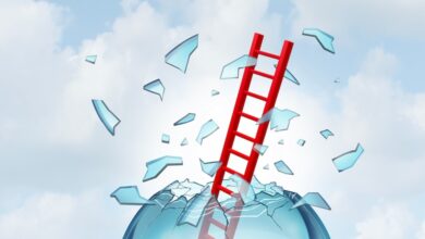 Breaking Glass Ceilings as a ladder of success breaking through an invisible barrier as a symbol of achieving higher career goals or becoming a leader.