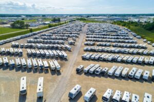 Oversize RV Transport: What Dealers Can Learn From Heavy Equipment Hauling 4 An aerial view of large RV and camper storage lot.