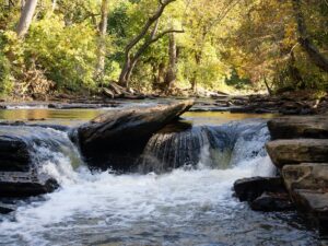 National Park Service Cuts Hit Home Along Chattahoochee 2 Surface Level View of a Small Waterfall on Big Creek in Chattahoochee River National Recreation Area in Autumn