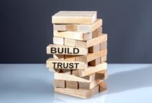 morin he text on wooden blocks build trust