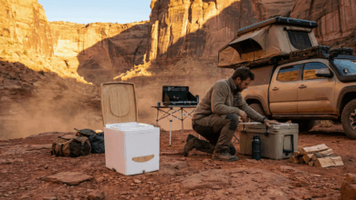 CompoCloset’s urine-diverting dry flush sealing toilet sitting next to a truck camper to illustrate RV fresh water and sanitation products and technologies.