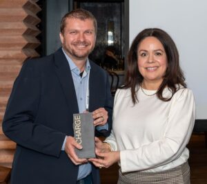Tyler Bourns Chief Marketing Officer Dragonfly Energy Accepting the CHARGE Award