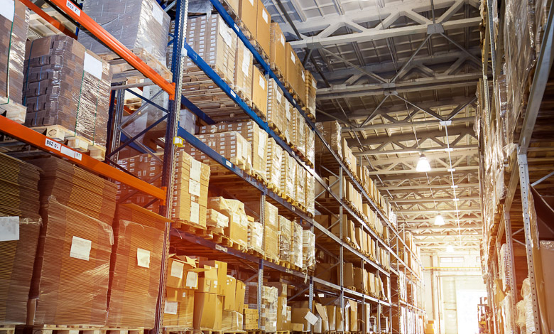 Interior of a warehouse, to illustrate an RV dealership storage area.