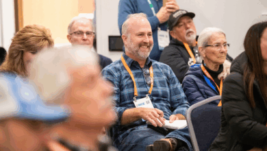 OHCE 2025 Attendee Erik Brown of Seal Rocks RV Cove Takes Note During a Breakout Session