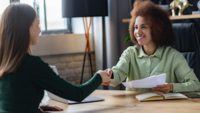 Recruitment manager shaking hands, hiring for job new employee sitting in office.