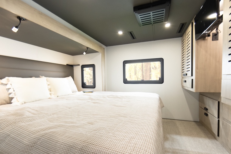 Grand Design Reveals New Lineage Series E 4 30DC Interior King Bed Hero 1