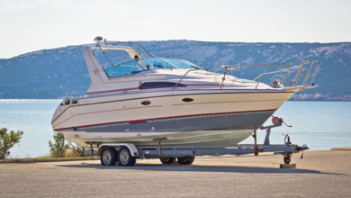 Boat on a trailer by the ocean, illustration what RV dealers can learn from the marine industry.