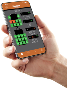 All in One Place 9 ASA hand holding smartphone w VSS TPMS app